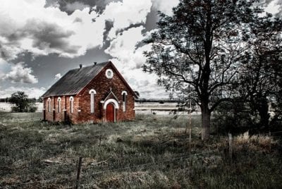 Does the steeple of the church, block the view of the cross